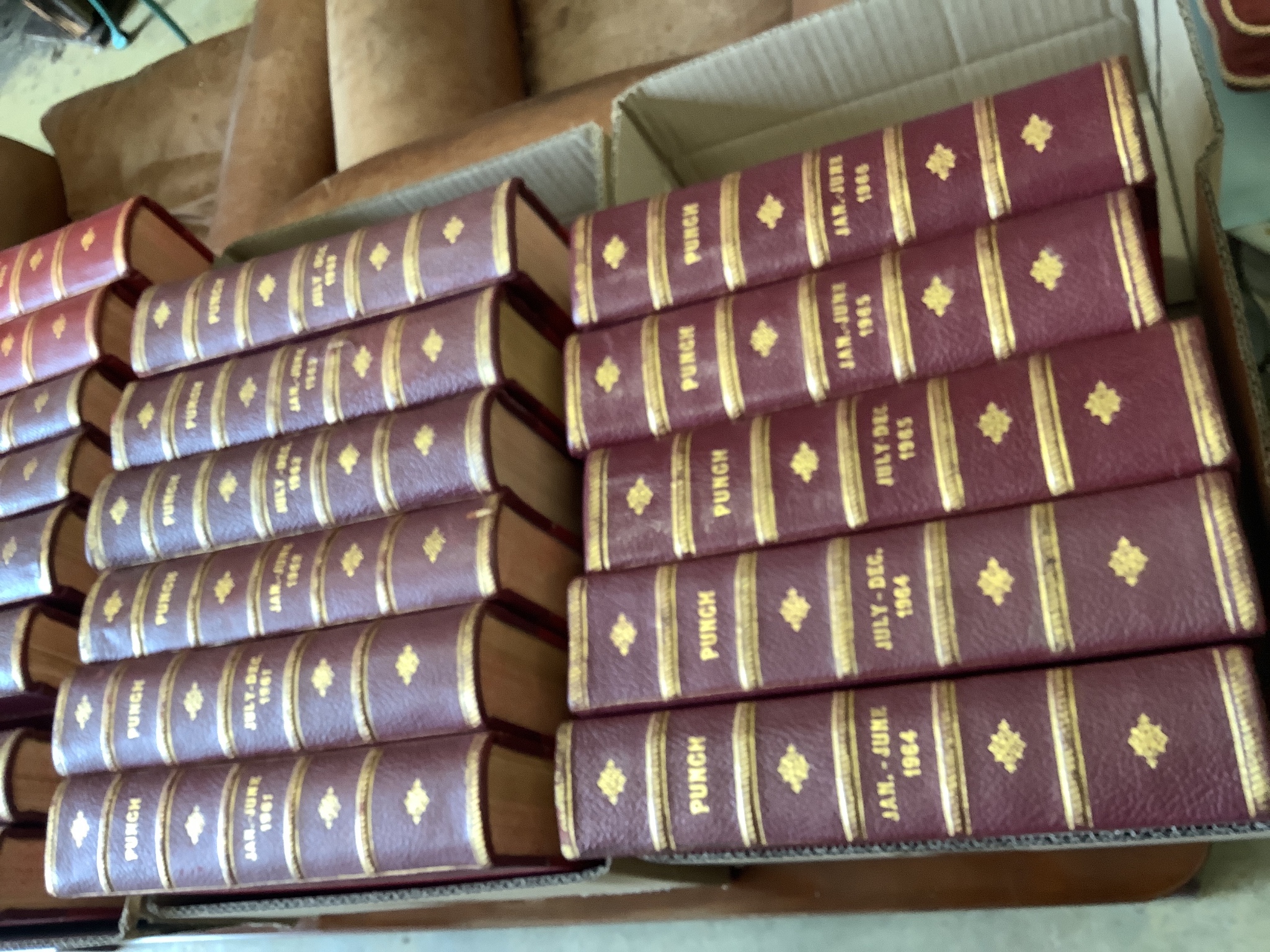 Punch Magazine January 1906 to June 1916, January 1917 to June 1938, January 1950 to June 1966 in 98 gilt tooled leather bindings